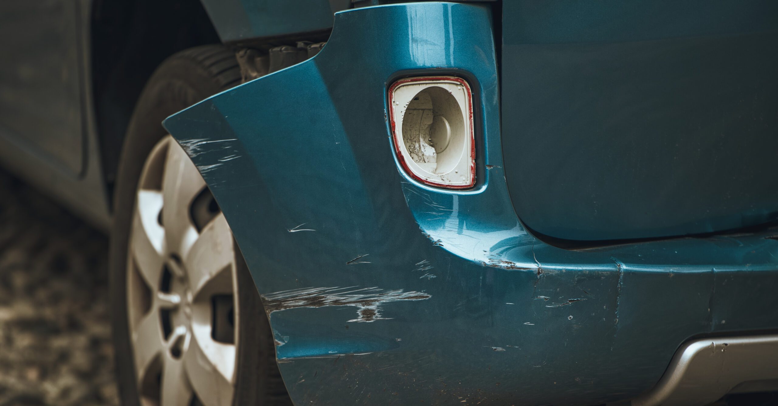 car-with-damaged-bumper-has-dent-it